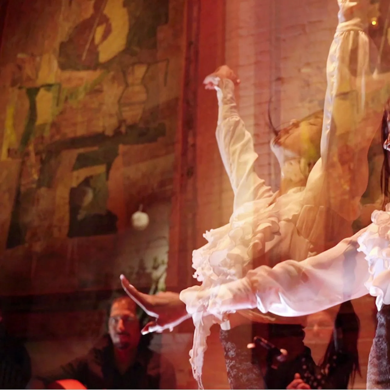 Flamenco dancer photographed in motion at Tablao de Carmen